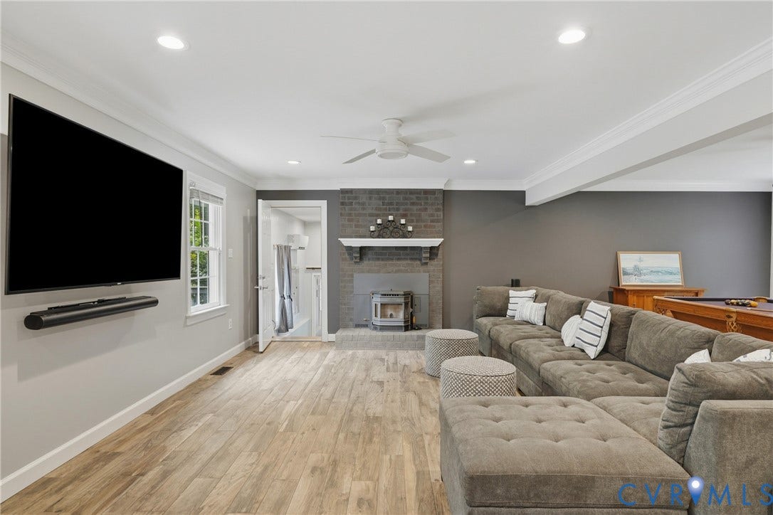 11150 Hames Lane, Glen Allen, VA 23059 Family room with pellet stove and tiled flooring