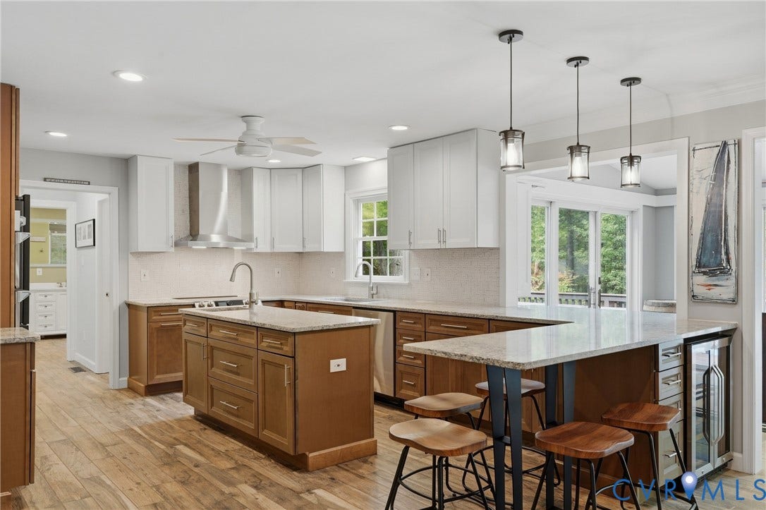 11150 Hames Lane, Glen Allen, VA 23059 Expansive kitchen featuring tiled flooring, a central island with a prep sink and garbage disposal