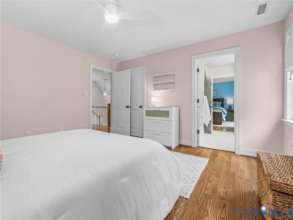 600 Baldwin Road, Henrico, VA 23229 Wood-finish flooring, white trim, and a ceiling fan with integrated lighting