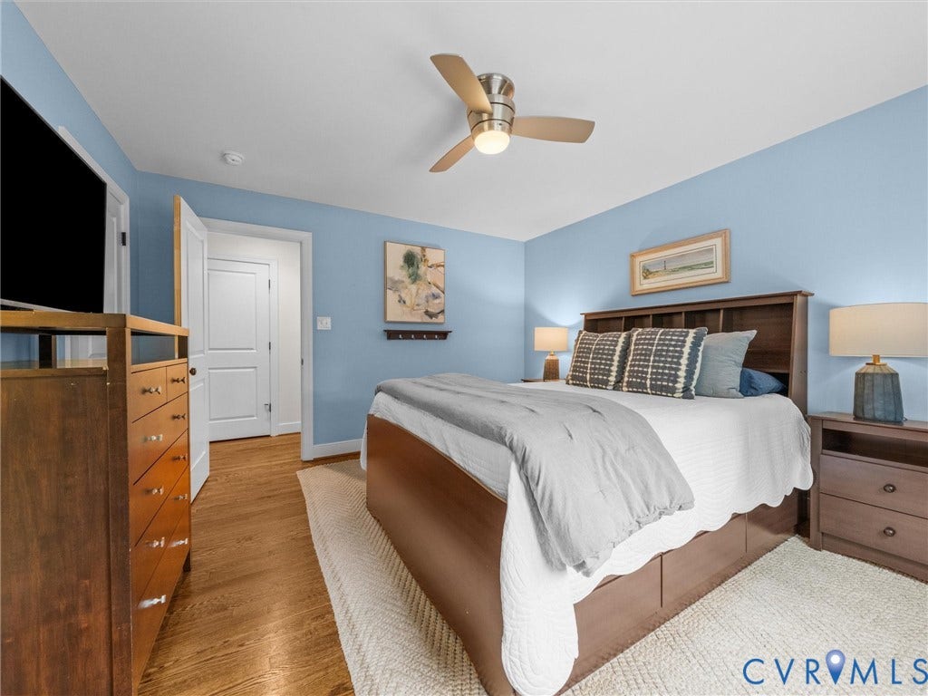 600 Baldwin Road, Henrico, VA 23229 Wood-finish flooring, overhead ceiling fan with integrated lighting, and white trim throughout