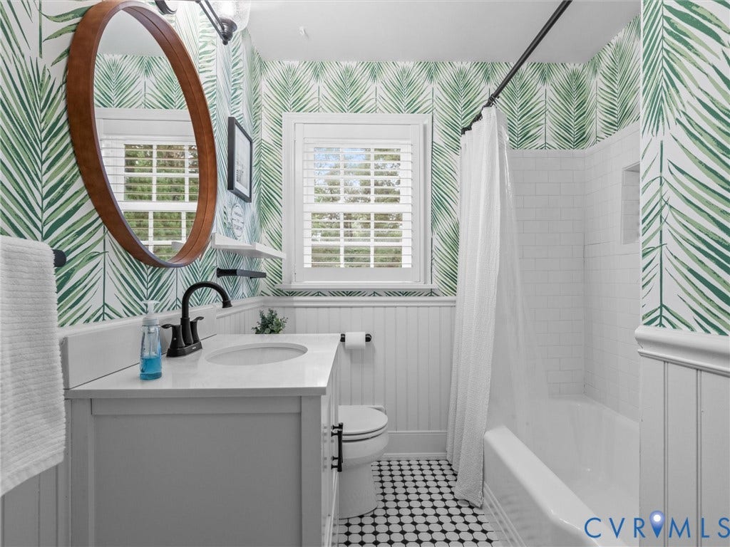 600 Baldwin Road, Henrico, VA 23229 White vanity with an integrated sink and matte black faucet