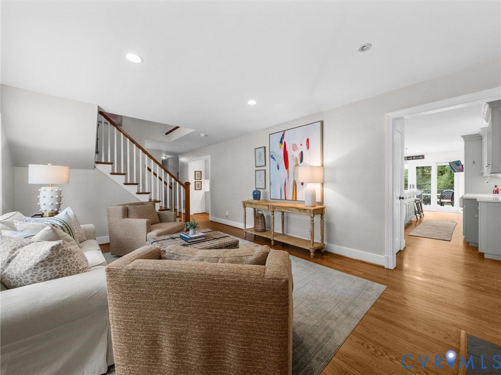 600 Baldwin Road, Henrico, VA 23229 Hardwood flooring, recessed lighting, white trim, open doorway, and a staircase with wood treads and white risers