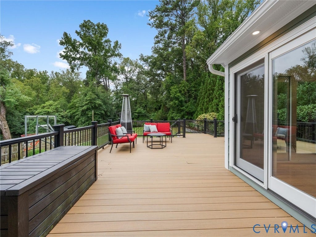 600 Baldwin Road, Henrico, VA 23229 Expansive deck featuring wood-finish composite decking and black metal railings