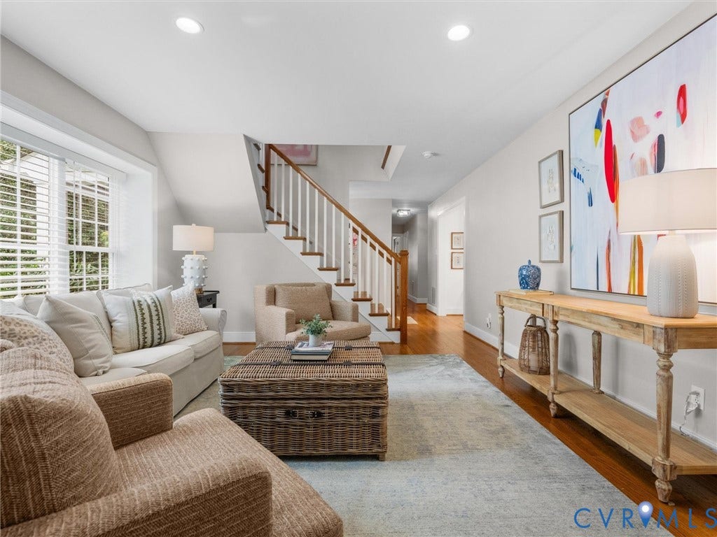 600 Baldwin Road, Henrico, VA 23229 Recessed lighting, wood-finish flooring, staircase with wood handrail and white balusters, and a console table with lower shelf