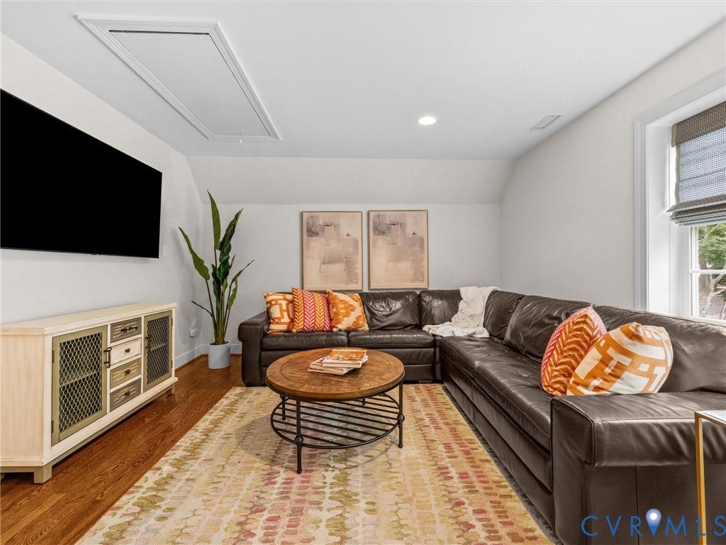 600 Baldwin Road, Henrico, VA 23229 Hardwood flooring, recessed ceiling lighting, sloped ceiling, and a window with blinds
