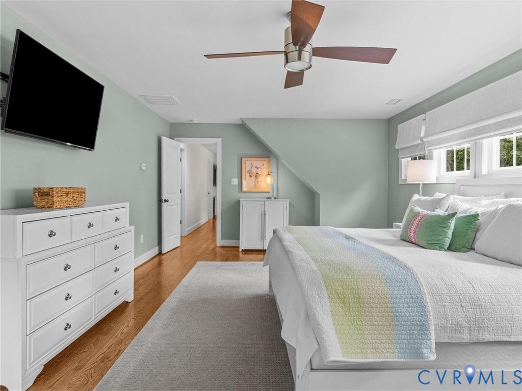 600 Baldwin Road, Henrico, VA 23229 Recessed ceiling fan with wood-finish blades, wood-finish flooring, and white trim windows
