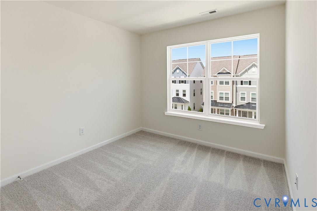 2423 Flora Boulevard, Townes At Arcadia, Henrico, VA 23231 This photo shows a similar floorplan and quality level to Eastwood Homes. Actual design selections and layout may vary.