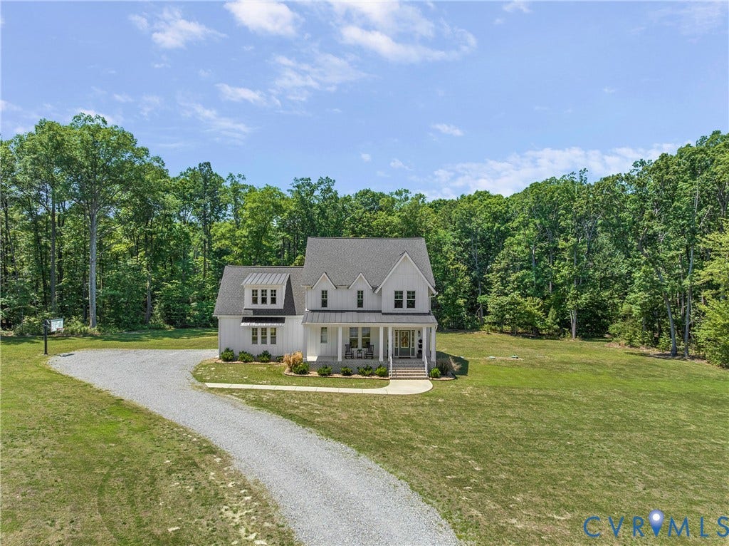 13003 Farrington Place Lane, Farrington Place, Hanover, VA 23059 Modern farmhouse-style residence with white board-and-batten siding and a dark shingled roof