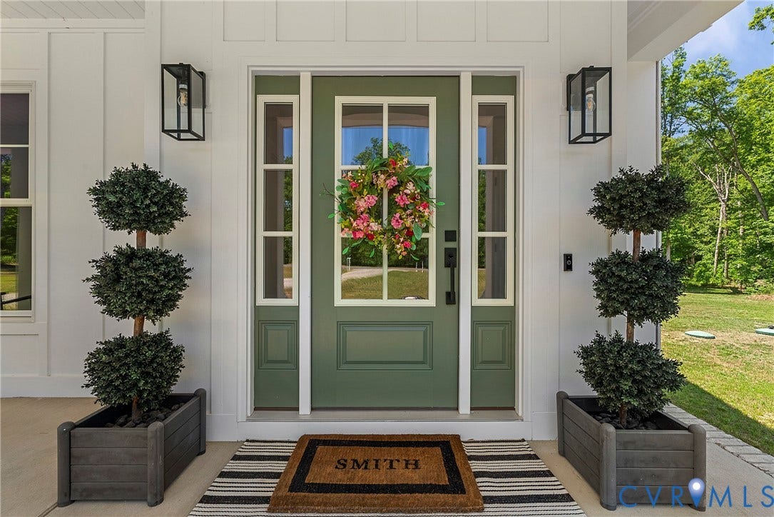 13003 Farrington Place Lane, Farrington Place, Hanover, VA 23059 Front entrance with a green panel door, clear glass transom, and sidelights
