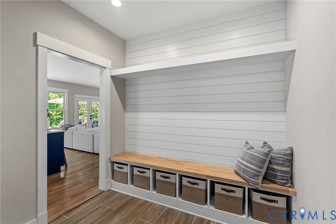 13003 Farrington Place Lane, Farrington Place, Hanover, VA 23059 Built-in storage bench with wood top, open shelving, and shiplap-style wall