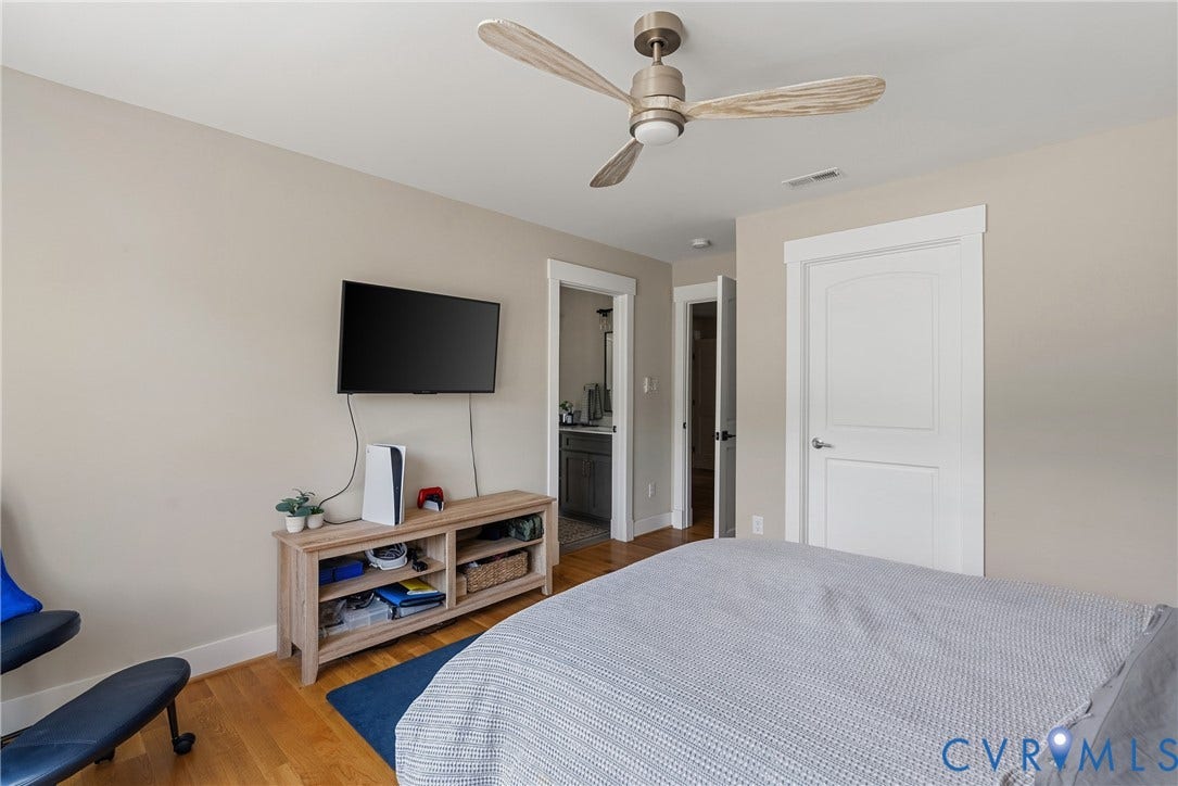 13003 Farrington Place Lane, Farrington Place, Hanover, VA 23059 Wood-finish flooring, ceiling fan with integrated lighting, flat-panel interior doors, and neutral wall tones