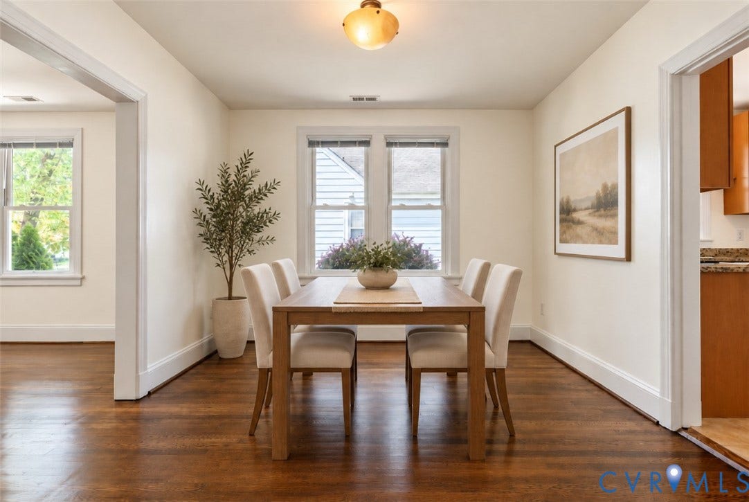 Hardwood flooring throughout, recessed window, and a built-in light fixture