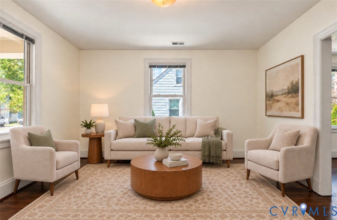 Hardwood flooring throughout, neutral wall tones, and overhead lighting