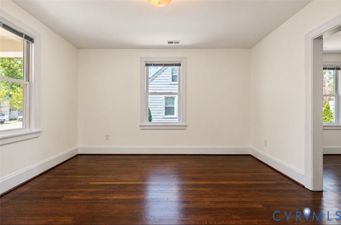 Rich wood flooring throughout