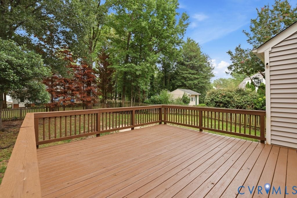 9612 Kingscroft Drive, Glen Allen, VA 23060 Spacious outdoor deck with wood railing and natural wood-finish decking