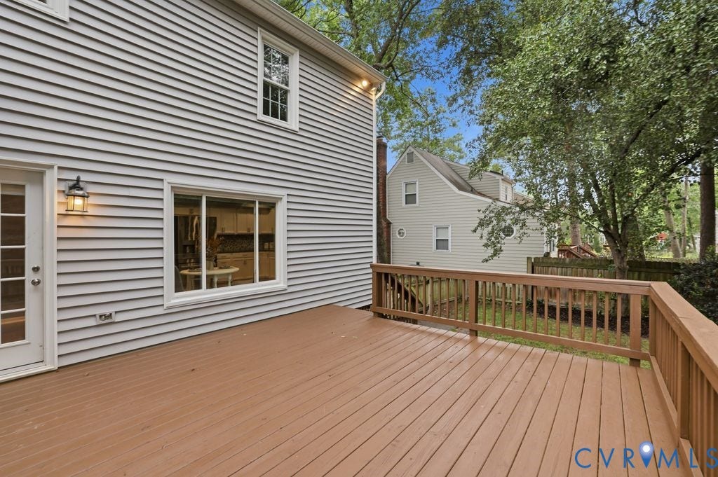 9612 Kingscroft Drive, Glen Allen, VA 23060 Expansive wood deck with a perimeter railing