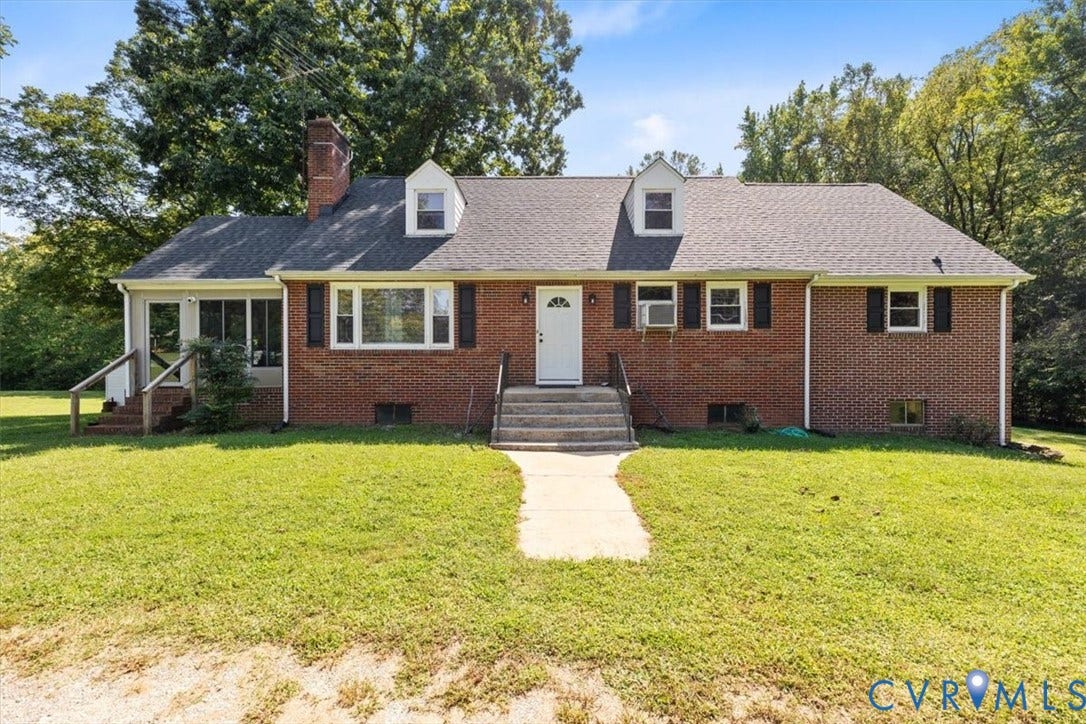 3577 Old Buckingham Road, Powhatan, VA 23139 Brick exterior with a gabled roof and two dormer windows