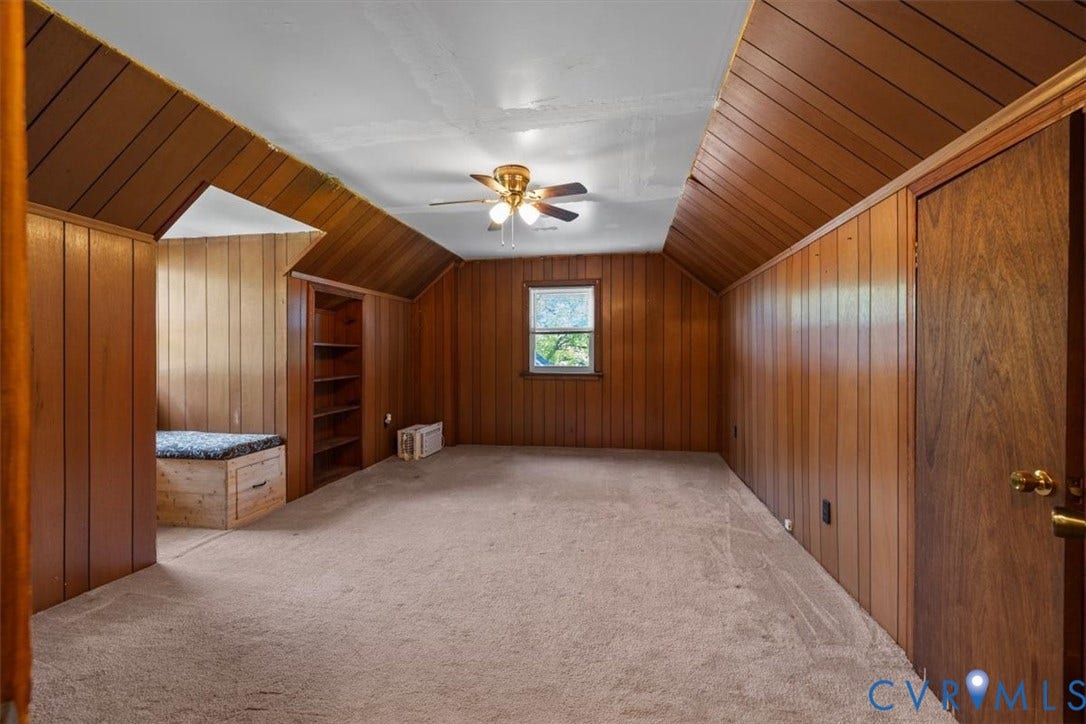 3577 Old Buckingham Road, Powhatan, VA 23139 Wood paneling, built-in shelving, carpet flooring, ceiling fan, and built-in window seat