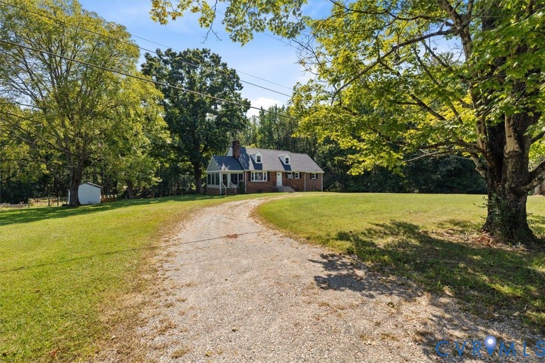 3577 Old Buckingham Road, Powhatan, VA 23139 Brick and siding exterior with a covered porch