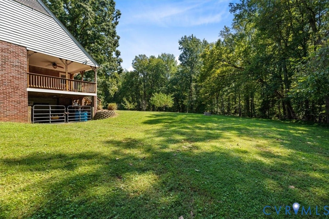 3577 Old Buckingham Road, Powhatan, VA 23139 Expansive grassy yard bordered by mature trees