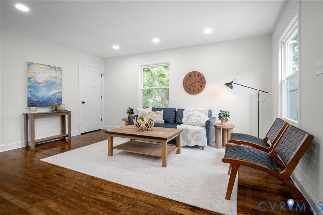 2211 Royall Avenue, Bellemeade, Richmond, VA 23224 Rich wood-finish flooring, recessed ceiling lighting, bright white walls, and a white three-panel interior door