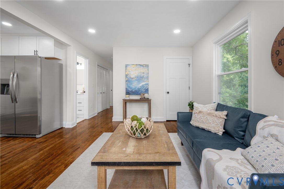2211 Royall Avenue, Bellemeade, Richmond, VA 23224 Recessed lighting, wood-finish flooring, white paneled doors, and a stainless steel refrigerator