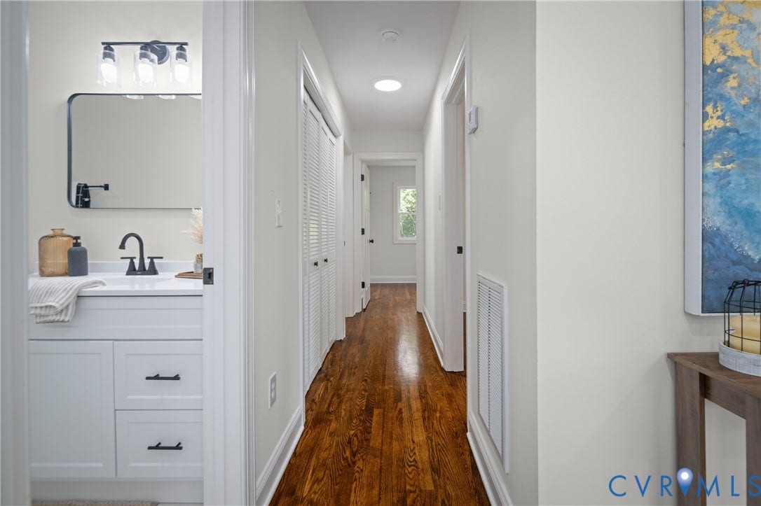 2211 Royall Avenue, Bellemeade, Richmond, VA 23224 Hallway featuring wood-finish flooring, white walls, and a recessed ceiling light