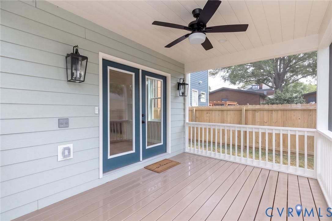 404 W 31st Street, Woodland Heights, Richmond, VA 23225 Covered porch with composite decking, white railing, and a ceiling fan