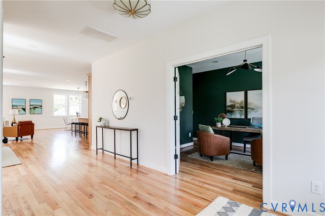 404 W 31st Street, Woodland Heights, Richmond, VA 23225 Hardwood flooring, recessed lighting, and a dedicated room with dark green walls and a contemporary ceiling fixture