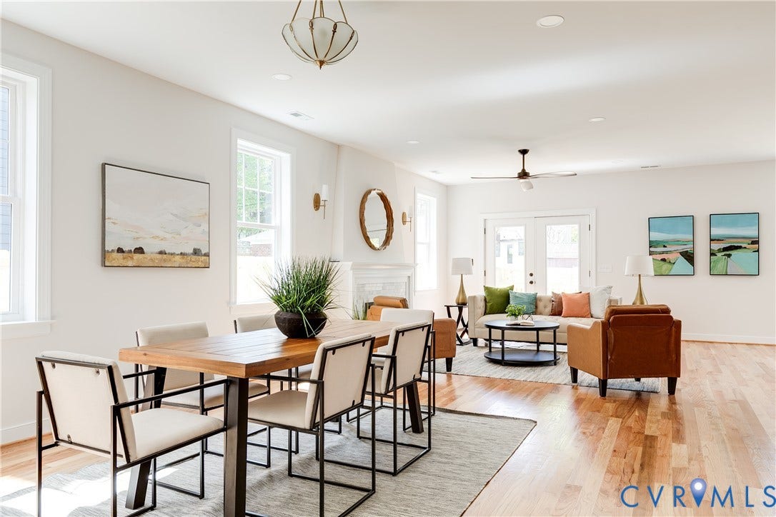 404 W 31st Street, Woodland Heights, Richmond, VA 23225 Hardwood flooring throughout, multiple windows providing ample natural light, ceiling fan, recessed lighting, and wall sconces