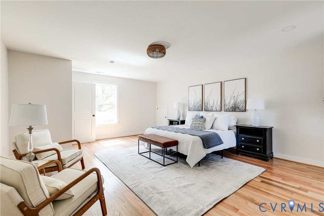 404 W 31st Street, Woodland Heights, Richmond, VA 23225 Hardwood flooring, recessed lighting, and a window with white trim