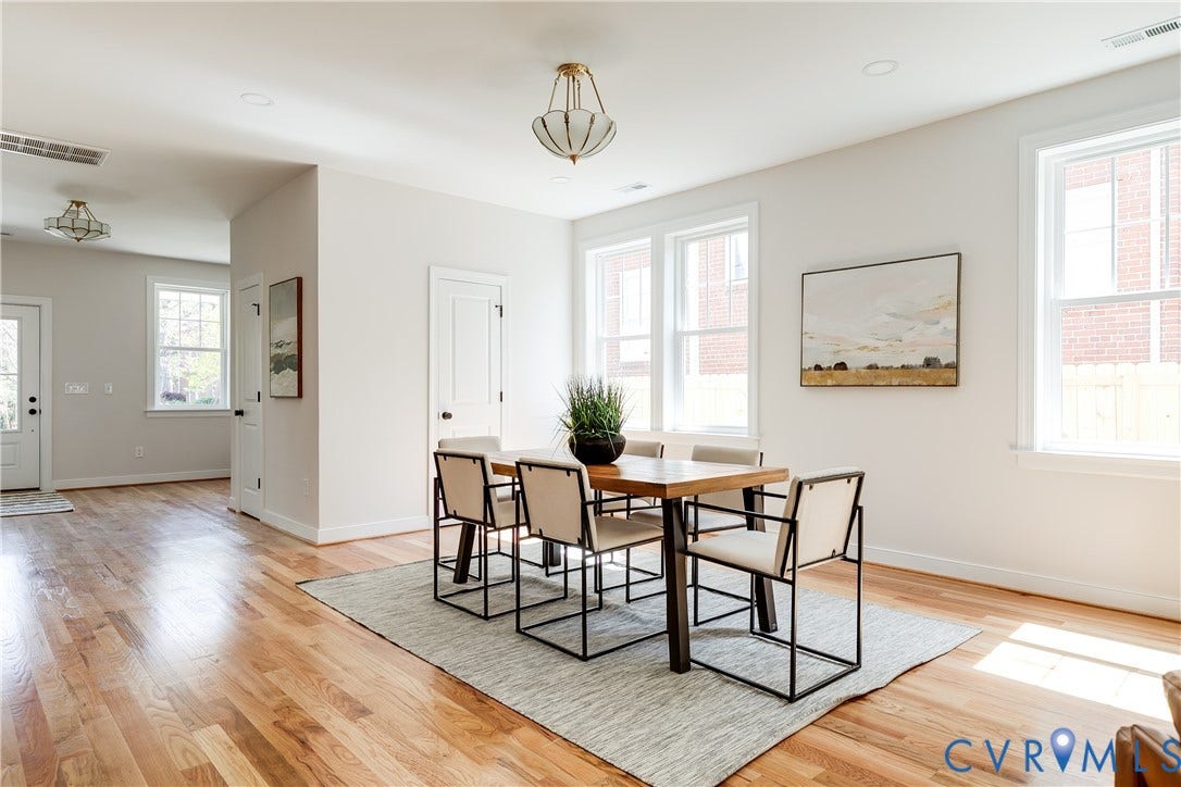404 W 31st Street, Woodland Heights, Richmond, VA 23225 Hardwood flooring throughout, multiple windows, recessed lighting, and a decorative ceiling fixture