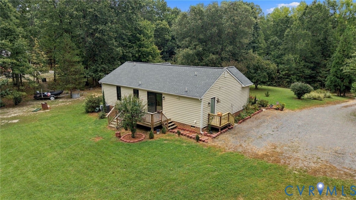 133 Ford Road, Bumpass, VA 23024 Ranch-style residence featuring light-colored siding and a dark shingle roof
