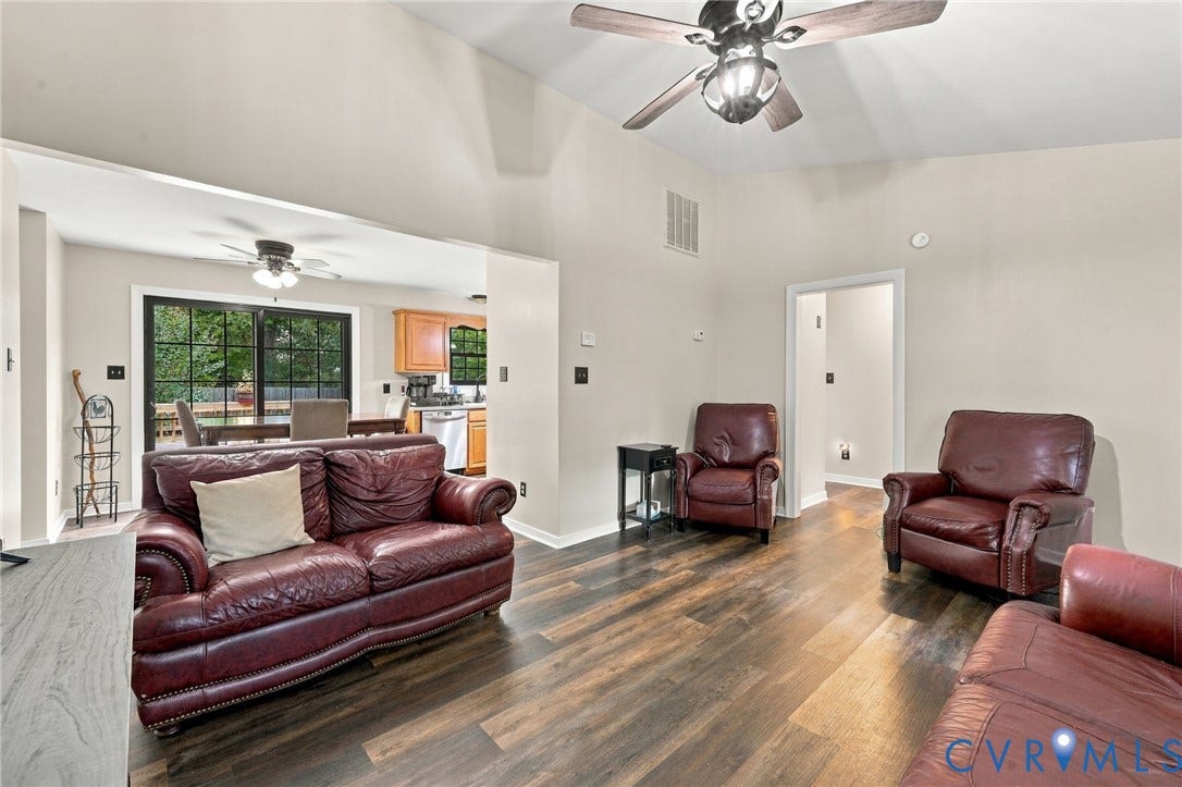 133 Ford Road, Bumpass, VA 23024 Vaulted ceiling, wood-finish flooring, ceiling fans, sliding glass doors, and recessed lighting