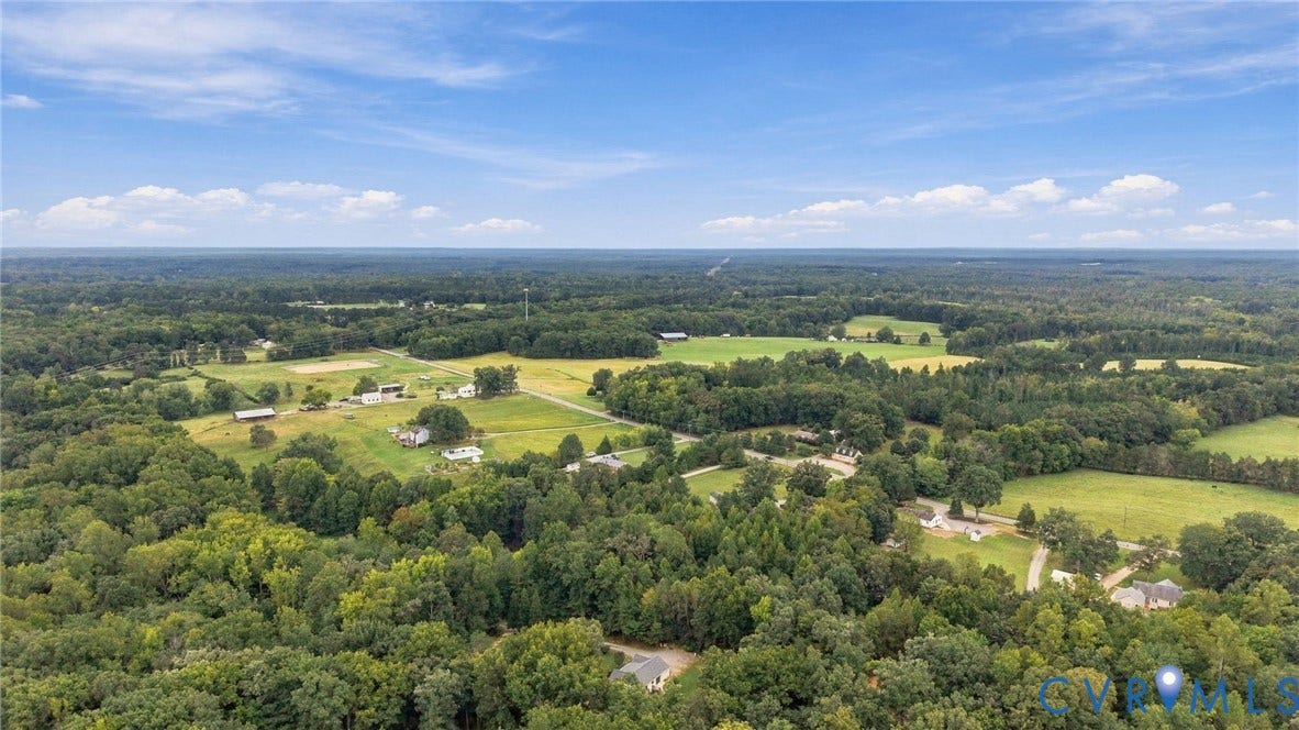 133 Ford Road, Bumpass, VA 23024 Expansive property featuring wooded areas and open fields