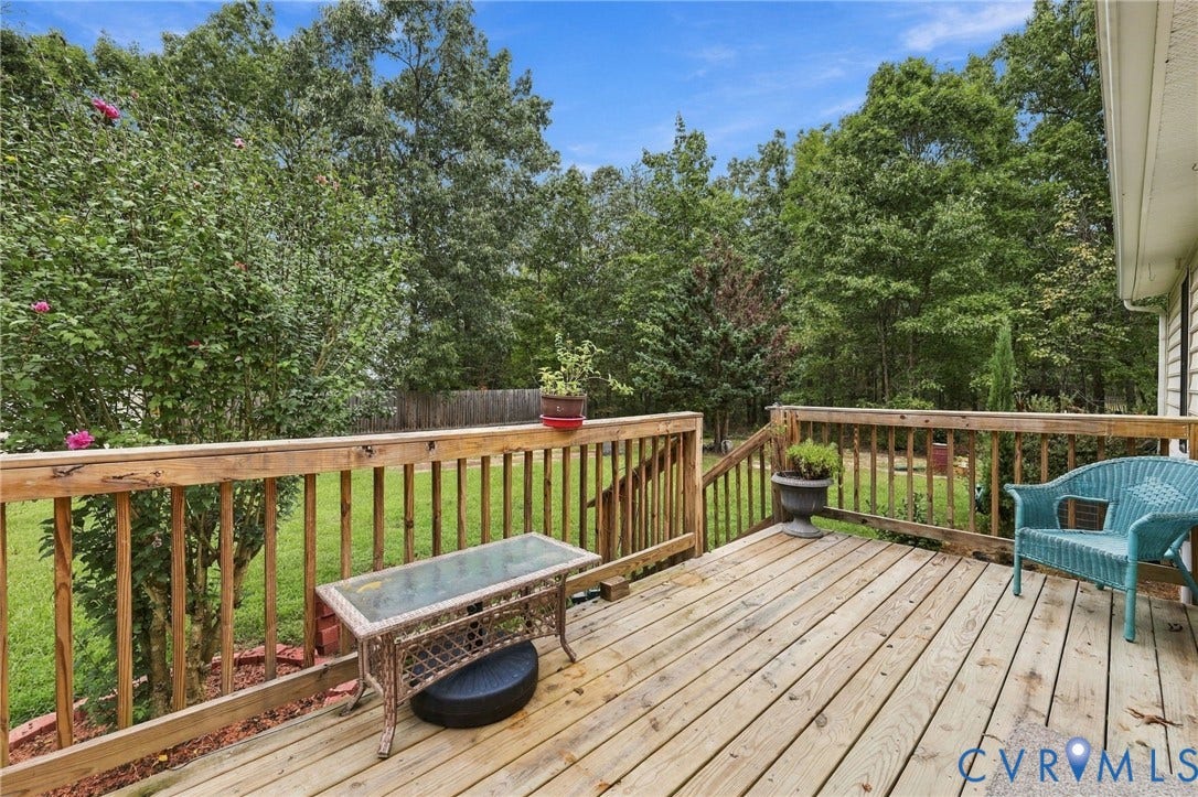 133 Ford Road, Bumpass, VA 23024 Wood deck with a natural finish, wood railing, and stairs