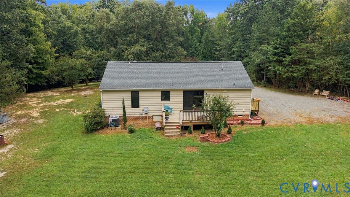 133 Ford Road, Bumpass, VA 23024 Exterior siding with a shingle roof and a rear deck