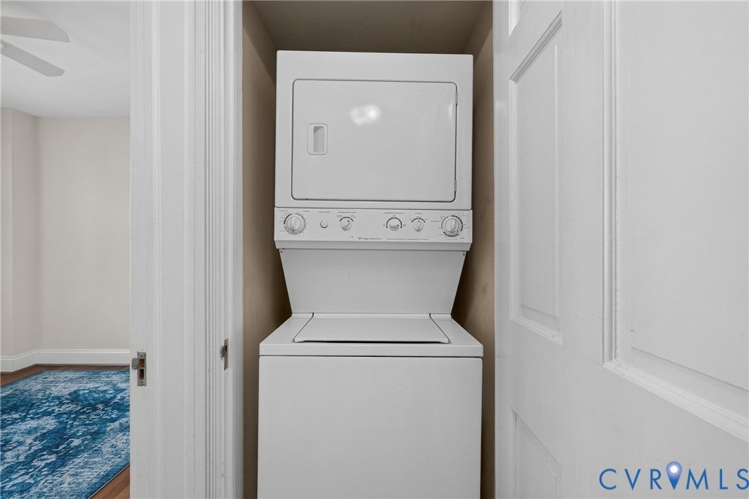 Stackable washer and dryer unit within a built-in closet