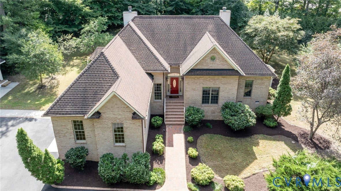 365 Hamlet Road, Manakin Sabot, VA 23103 Brick exterior with a peaked roofline, front entry with an elevated walkway, and mature landscaping