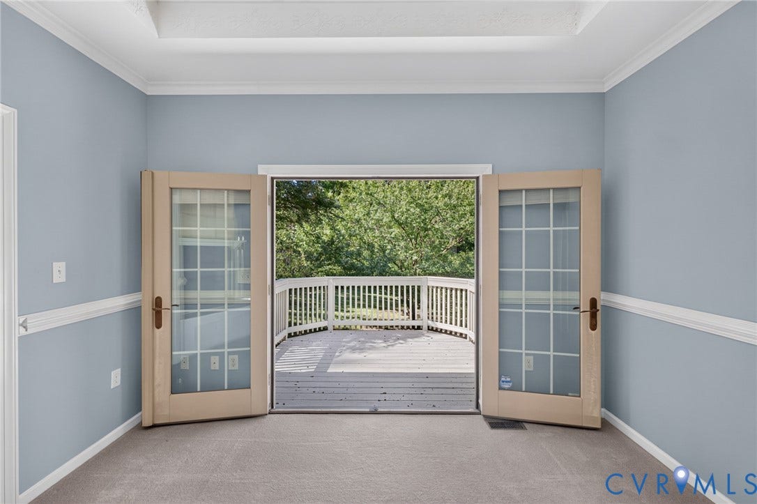 365 Hamlet Road, Manakin Sabot, VA 23103 Dual French doors opening to an expansive outdoor deck with railing, crown molding, and recessed ceiling details
