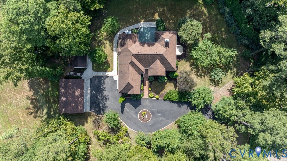 365 Hamlet Road, Manakin Sabot, VA 23103 Expansive property featuring a circular driveway, detached garage, and a swimming pool