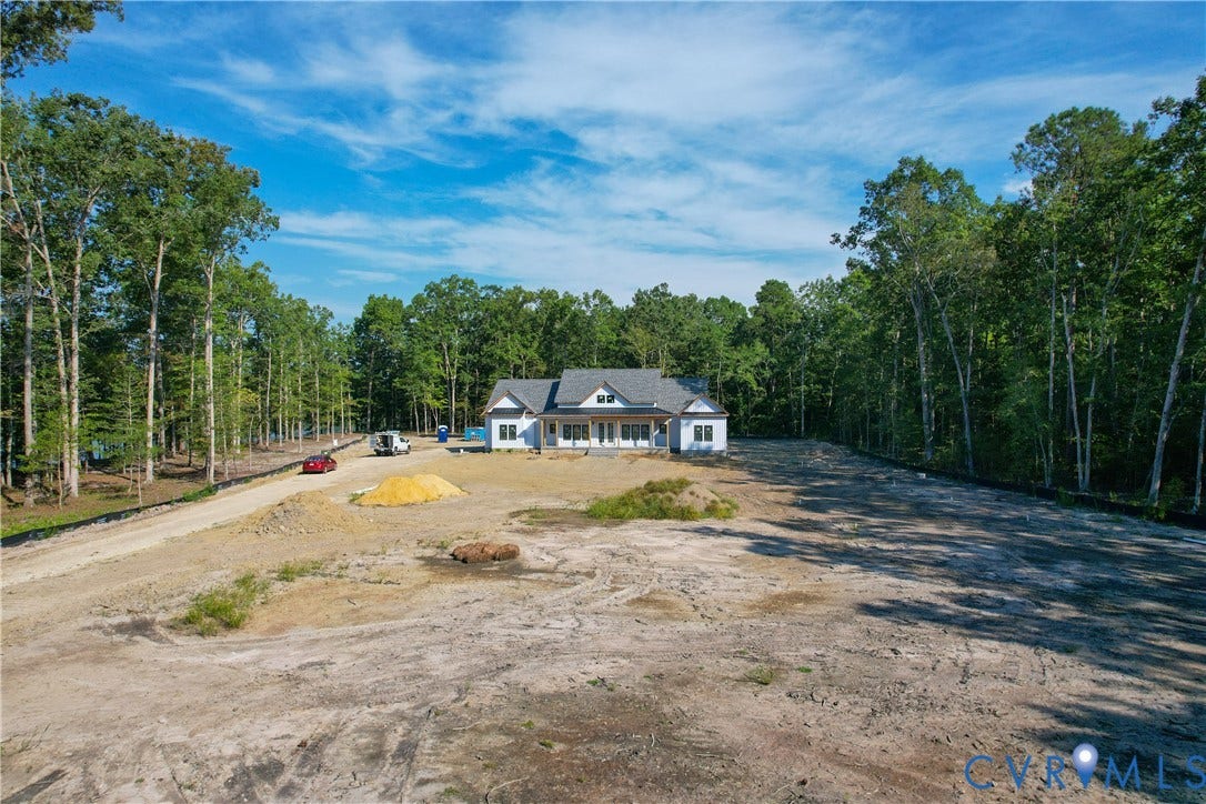 13216 Bradley Bridge Road, Chester, VA 23831 Single-story residence with a light gray exterior
