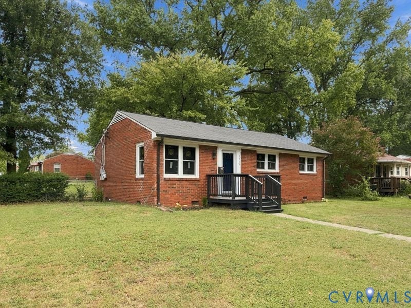 Brick exterior with white window trim