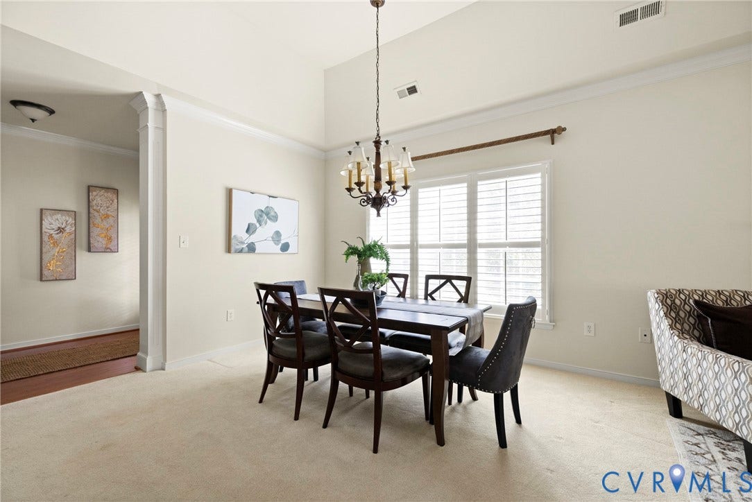 14119 Shawhan Place, Charter Colony, Midlothian, VA 23114 Vaulted ceiling, crown molding, white window shutters, and a chandelier