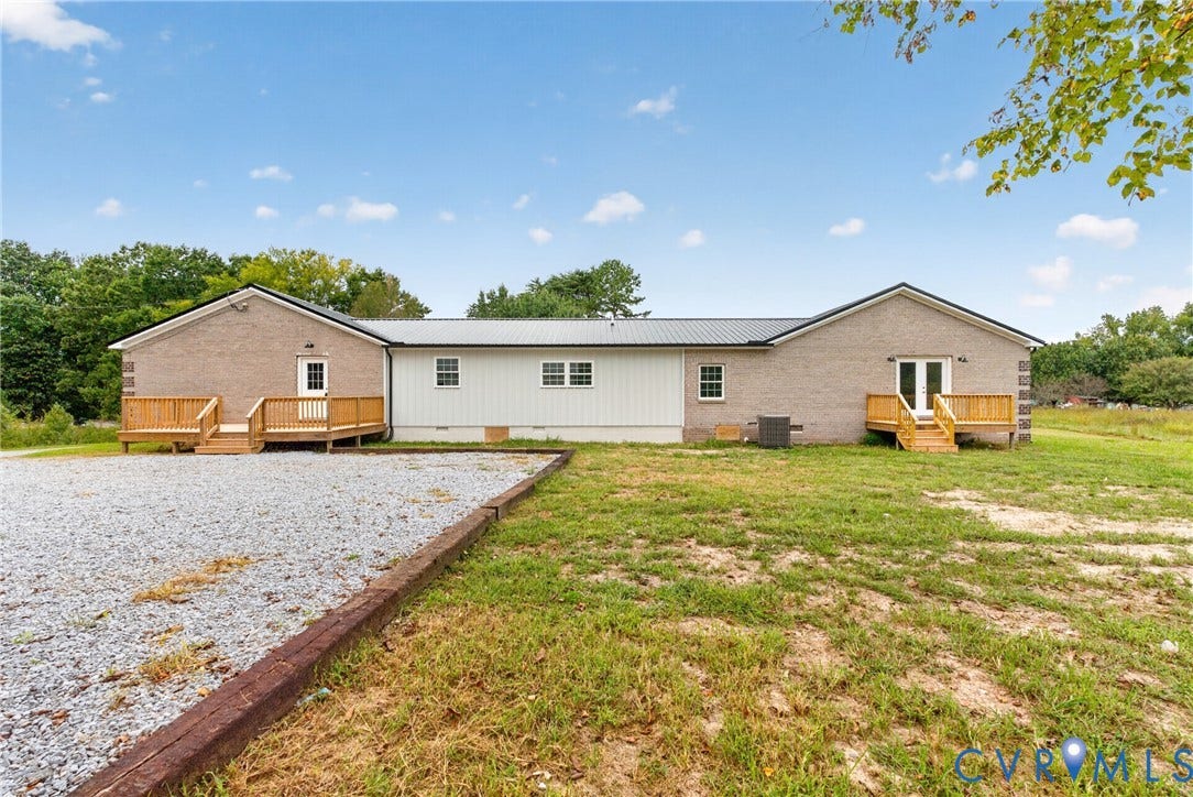 7621 Amelia Springs Road, Amelia, VA 23083 Brick and siding exterior with a metal roof