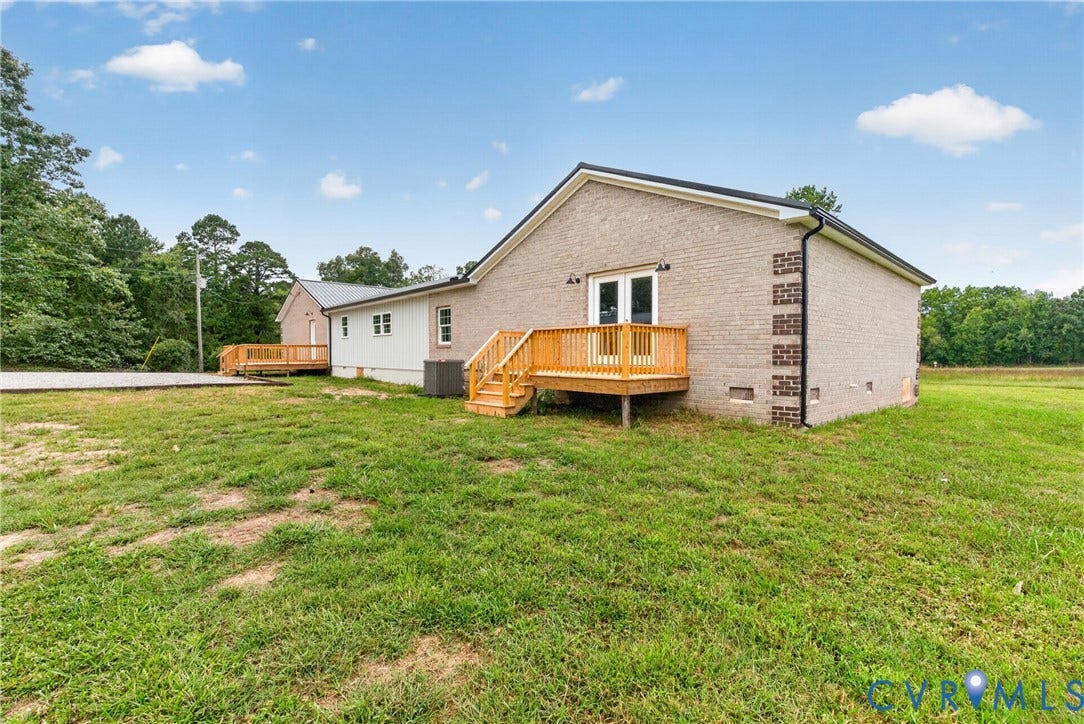 7621 Amelia Springs Road, Amelia, VA 23083 Light-colored brick exterior with dark brick accents