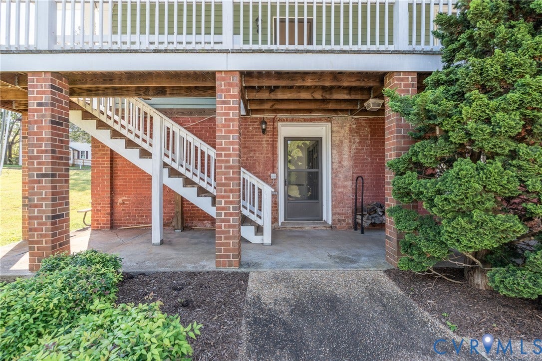 13085 W James Anderson Highway, Buckingham, VA 23921 Brick exterior with white balustrade and stairs