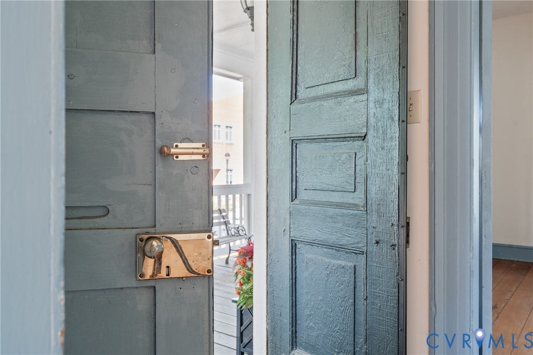 13085 W James Anderson Highway, Buckingham, VA 23921 Panelled door with brass hardware