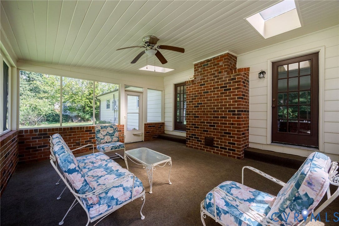3356 Seaton Road, Petersburg, VA 23805 Screened porch featuring brick accents, slatted ceiling, and skylights, Doors provide access to the den.