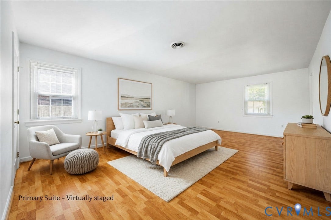 3356 Seaton Road, Petersburg, VA 23805 Primary suite. Wood like flooring, crisp white walls. 3 closets. Attached full bath. 2 windows.